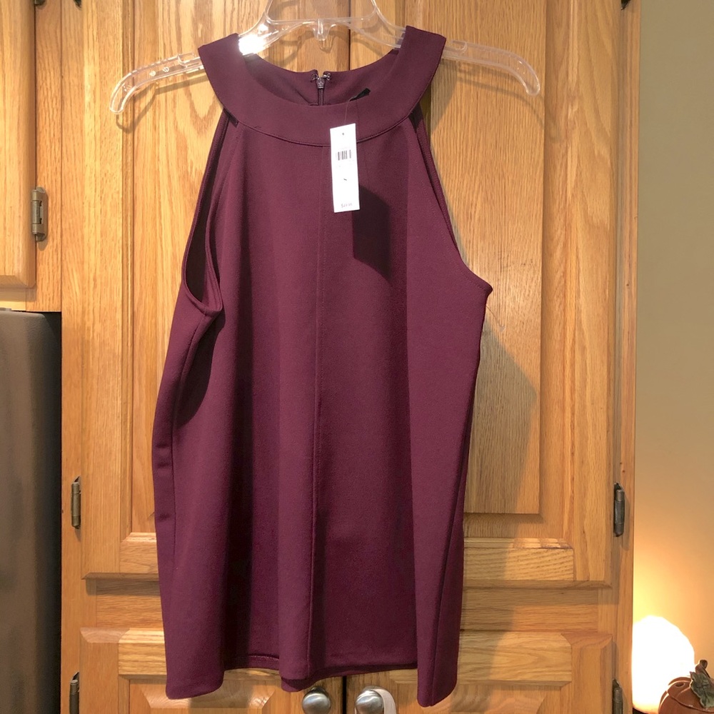 Sleeveless plum colored shirt/ blouse